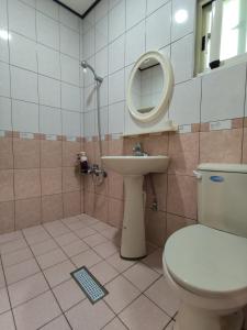Phòng tắm tại Xiao Guilin Homestay
