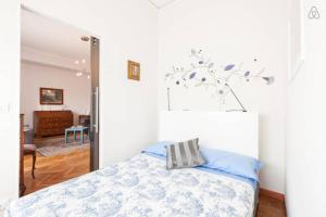 Cama o camas de una habitación en Charming Apartment Piazza del Popolo