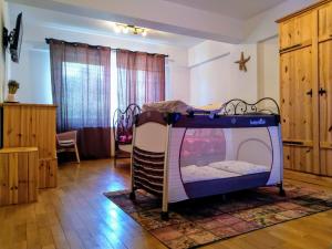 Ένα ή περισσότερα κρεβάτια σε δωμάτιο στο Silvia's Apartment