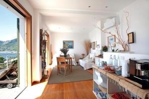 a living room with a view of the ocean at Arpaiu in Manarola