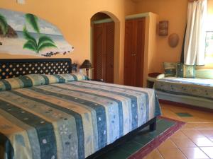 Voodi või voodid majutusasutuse Hotel - Residencial Madrugada toas