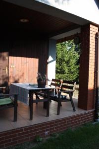 Patio alebo iná vonkajšia časť ubytovania Pod Modrzewiem