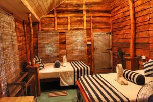 Postel nebo postele na pokoji v ubytování Green Garden Resort