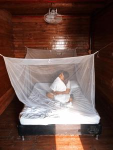 
Cama o camas de una habitación en Isla Roots Hostel
