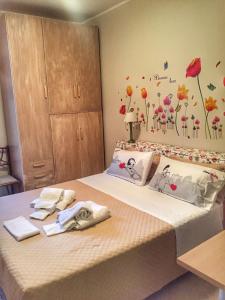 Ein Bett oder Betten in einem Zimmer der Unterkunft Villa Santa Margherita