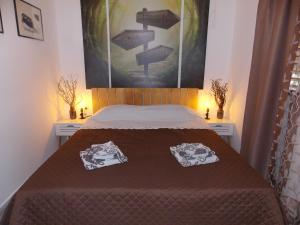 Posteľ alebo postele v izbe v ubytovaní Apartment with private garden, hot tub, WiFi, SAT TV, Klima, near beach
