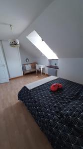 Postel nebo postele na pokoji v ubytování Gîte Cocantin
