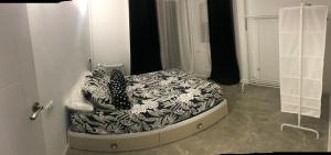 Postel nebo postele na pokoji v ubytování Piso Badajoz