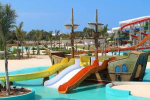 a water park with a slide in the water at Appart Clim Wifi 700m de la Plage in Saïdia