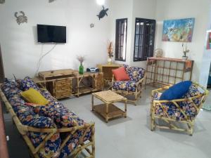 Et tv og/eller underholdning på Casa Frente MAR PISCINA