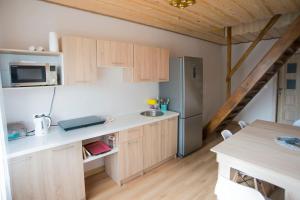 Afbeelding uit fotogalerij van Domki u Justyny Podgórzyn Karpacz Sosnówka in Podgórzyn