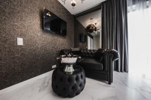 TV/trung tâm giải trí tại Luxury Suites Kaunas, self-check in