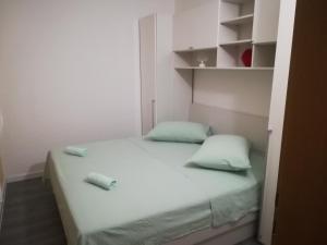 Postel nebo postele na pokoji v ubytování Apartment Nela
