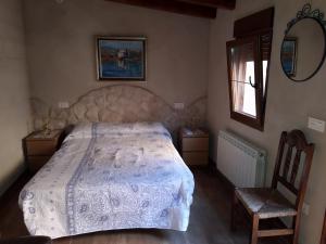 Postel nebo postele na pokoji v ubytování El Balcon de Peñafiel