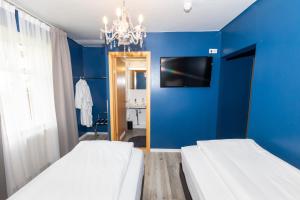 Krevet ili kreveti u jedinici u okviru objekta Hotel North