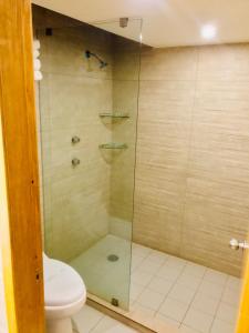 Een badkamer bij Hotel & Suites Victoria