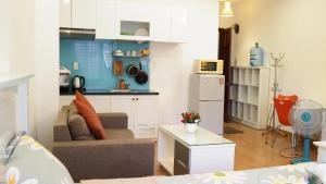 Kuchyň nebo kuchyňský kout v ubytování Smiley Apartment 3