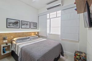 Postel nebo postele na pokoji v ubytování STUDIO ACONCHEGANTE à 3 min da praia de copa!