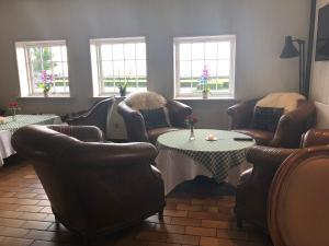 Posezení v ubytování Munkebo Kro & Hotel