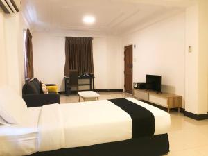 Katil atau katil-katil dalam bilik di K.C Hotel