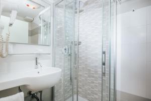 Koupelna v ubytování Hotel Vienna