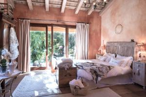 Ένα ή περισσότερα κρεβάτια σε δωμάτιο στο B&B Maison Parco Del Brenta