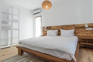 En eller flere senge i et værelse på Camping Gradina