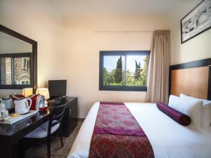 Postel nebo postele na pokoji v ubytování New Capitol Hotel - Jerusalem + 37 fotografií