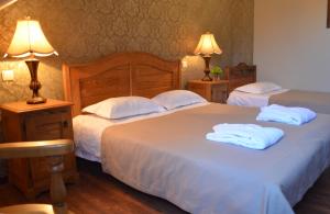 Ένα ή περισσότερα κρεβάτια σε δωμάτιο στο Hotel Brigitte