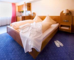 Postel nebo postele na pokoji v ubytování Wellness-Hotel Talblick