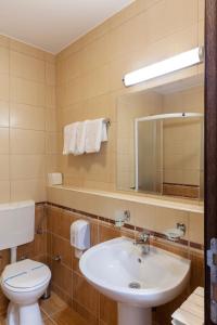 Koupelna v ubytování Hotel Livade