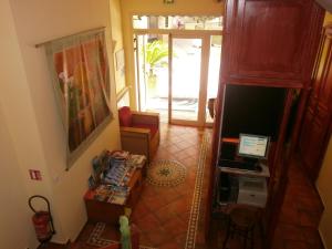 an aerial view of a living room with a television at Little Palace in Toulon