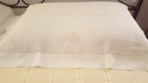 Letto o letti in una camera di Casa Leonardo
