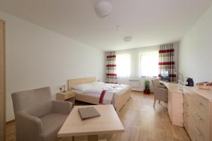 Postel nebo postele na pokoji v ubytování Resort Johanka