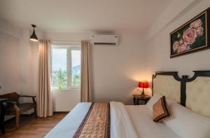 Postel nebo postele na pokoji v ubytování Bellevue Hotel
