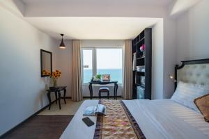 Postel nebo postele na pokoji v ubytování Bellevue Hotel