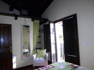 A bed or beds in a room at Mayorazgo De Altamira Mila