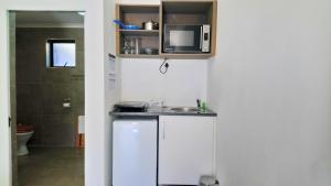 
A kitchen or kitchenette at Hippo Lodge Apartments
