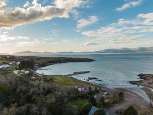 an aerial view of a lake with mountains in the distance at Kells Bay House and Gardens in Kells