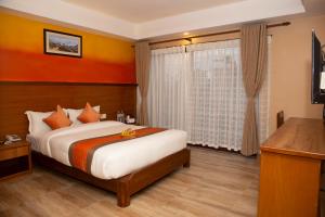 Ένα ή περισσότερα κρεβάτια σε δωμάτιο στο Hotel Lake Star