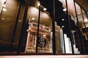 a statue in a display case in a building at Paragon 700 Boutique Hotel & SPA in Ostuni