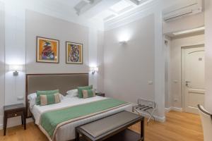 Cama ou camas em um quarto em Internazionale Domus
