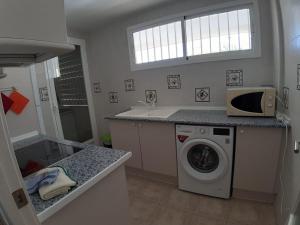 Kuchyňa alebo kuchynka v ubytovaní Urbanización Sueños de Denia II apto 2 habitaciones