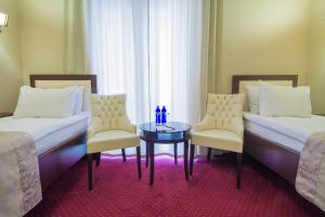 A seating area at Marionn Hotel