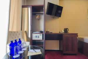 A kitchen or kitchenette at Marionn Hotel