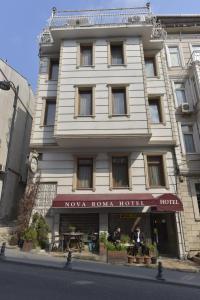 a large white building with a hotel at Nova Roma Hotel in Istanbul