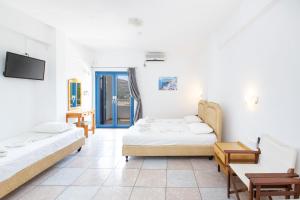 Posteľ alebo postele v izbe v ubytovaní Marcos Beach