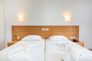 Posteľ alebo postele v izbe v ubytovaní Marcos Beach