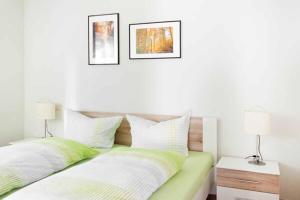 Postel nebo postele na pokoji v ubytování Ferienwohnung In der Altstadt