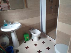 a bathroom with a sink and a toilet and a shower at Mafrolla Carlo in Vieste +80 photos